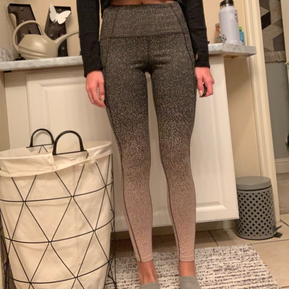 Black to pink speckled leggings.
